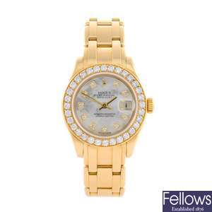 An 18ct gold automatic lady's Rolex bracelet watch.