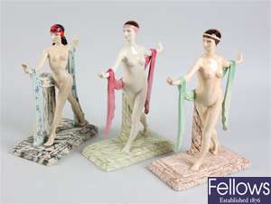 A Kevin Francis ceramic figurine and two other figurines
