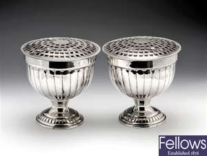A pair of silver plated rose bowls.