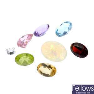 Five loose old-cut diamonds, an oval-cut amethyst and a quantity of semi-precious gemstones.