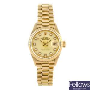 An 18k gold automatic lady's Rolex Oyster Perpetual Datejust bracelet watch.