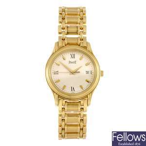 An 18k gold quartz lady's Piaget bracelet watch.