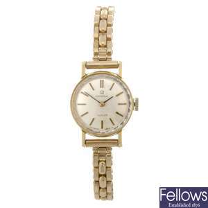 A gold plated manual wind lady's Omega bracelet watch retailed by Turler.