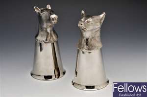 A pair of silver plated stirrup cups.
