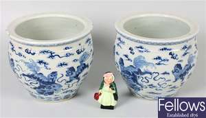A pair of late 19th century Chinese white glazed bowls
