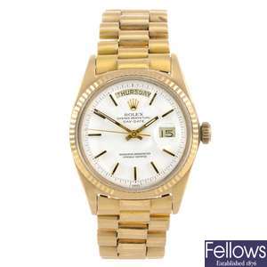 An 18k gold automatic gentleman's Rolex Oyster Perpetual Day-Date bracelet watch.