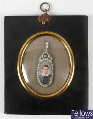 An early 20th century oval painted portrait miniatures