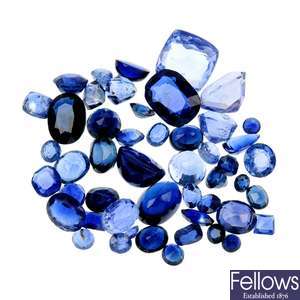 A quantity of loose sapphires and a tanzanite.