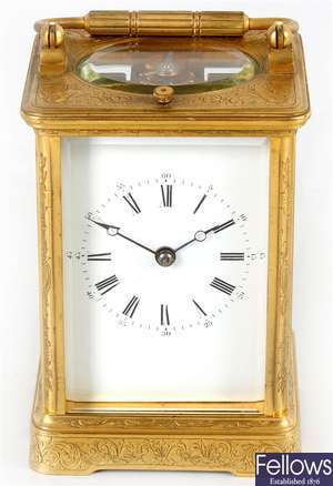 A 19th century brass carriage clock with push repeat.