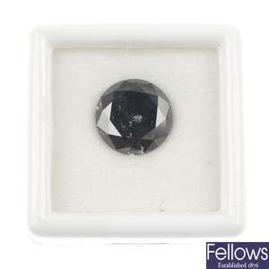 A treated loose brilliant-cut black diamond of 6.85cts.