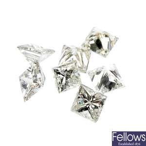 A quantity of loose square-shape diamonds.