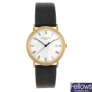 An 18k gold quartz gentleman's Patek Philippe Calatrava wrist watch.