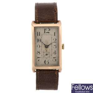 A 9ct gold manual wind gentleman's large Deco style wrist watch.