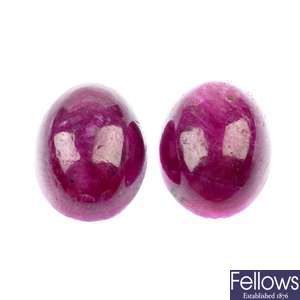 Two oval corundum cabochons and eight synthetic rubies.