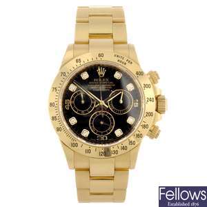 An 18k gold automatic chronograph gentleman's Rolex Daytona bracelet watch.