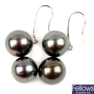 Two cultured pearls and a pair of cultured pearl ear pendants.