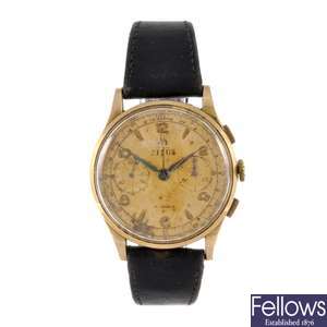 An 18k gold manual wind gentleman's chronograph wrist watch by Titus.