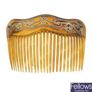 An early 20th century horn hair comb with hallmarks for 1906, and a mother-of-pearl hair comb.