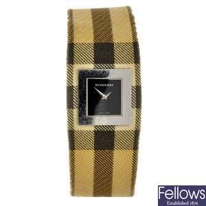 A stainless steel quartz lady's Burberry cuff watch.