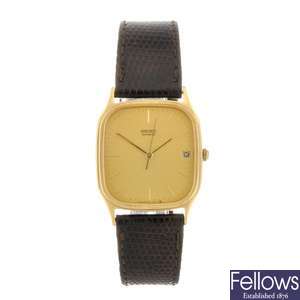 A gold plated quartz gentleman's Seiko wrist watch. Together with a similar example.