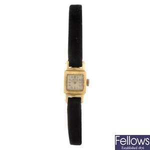 An 18k gold manual wind lady's Tissot wrist watch.