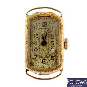 A 14k gold manual wind lady's watch head.