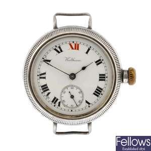 A silver manual wind trench style watch head by Waltham and a trench style watch.