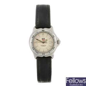 A stainless steel quartz lady's Tag Heuer S/el wrist watch.