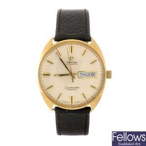 An 18k gold automatic gentleman's Omega Seamaster Cosmic wrist watch.