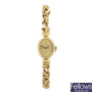 (309077868) A 14ct gold quartz lady's Vicence bracelet watch.
