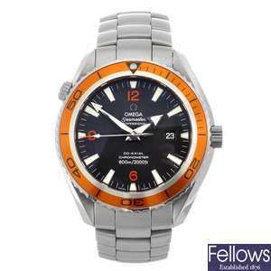 A stainless steel automatic gentleman's Omega Seamaster Planet Ocean Co-Axial bracelet watch.