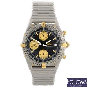A bi-colour automatic gentleman's Breitling Windrider Chronomat chronograph bracelet watch.