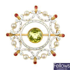 An early 20th century peridot, seed pearl and enamel brooch.