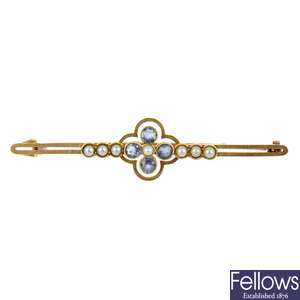 An early 20th century 15ct gold sapphire and split pearl brooch.
