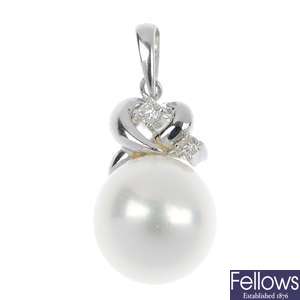 An 18ct gold cultured pearl and diamond pendant.