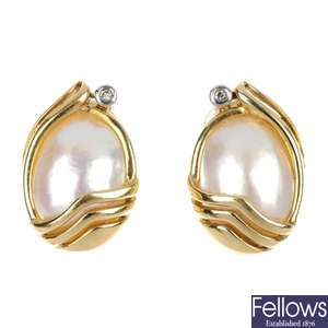A pair of 9ct gold mabe pearl and diamond earrings.
