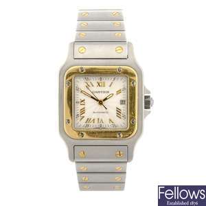 (116184372)  A bi-metal automatic Cartier Santos bracelet watch.