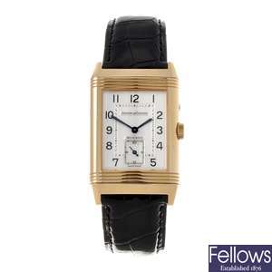An 18k gold manual wind gentleman's Jaeger-LeCoultre Reverso Duo wrist watch.