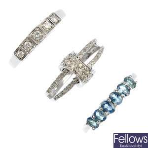 A selection of three 9ct gold gem set rings.