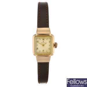 An 18k gold manual wind lady's Rolex wrist watch.