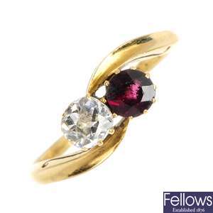 An Edwardian 18ct gold diamond and garnet two-stone ring.