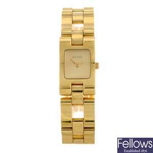 A gold plated quartz lady's Gucci 2305L bracelet watch.