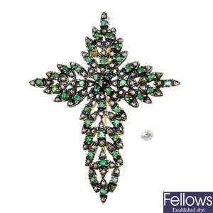 An emerald and diamond brooch and a loose diamond.