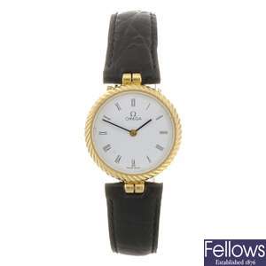 An 18k gold quartz lady's Omega wrist watch.