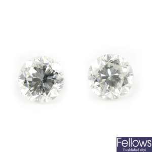 Two brilliant-cut diamonds, weighing 0.37 and 0.35ct. 