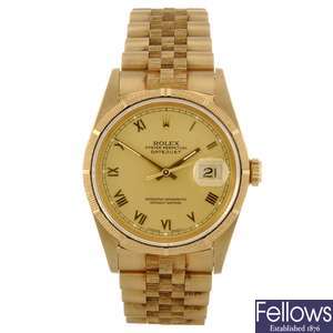 An 18k gold automatic gentleman's Rolex Oyster Perpetual Datejust bracelet watch.