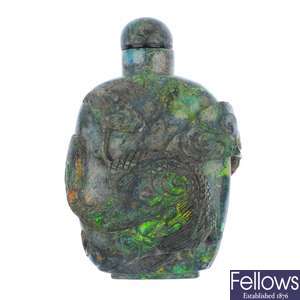 A carved sugar acid treated opal scent bottle.
