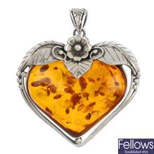 Selection of amber and gem-set jewellery.