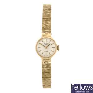 (304285588) A 9ct gold manual wind lady's Rotary bracelet watch.
