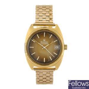 (043528) A gold plated electronic gentleman's Bulova Accutron bracelet watch.